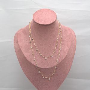 CCL0040010050 Collana placcata oro con punti luce, effetto layering.