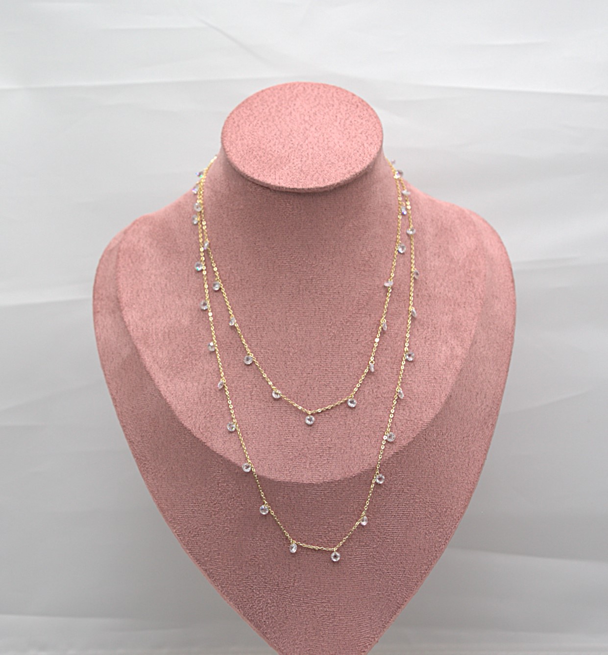 CCL0040010050 Collana placcata oro con punti luce, effetto layering.