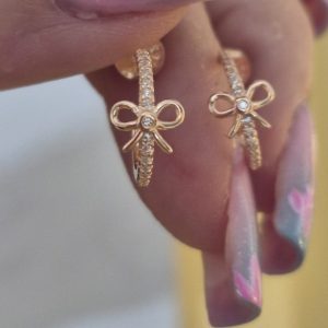 Piccoli Fiocchetti Luminosi Oro Rosa
