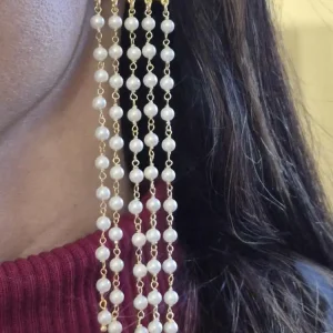 Orexxhini a casata con perline di colore bianco perla